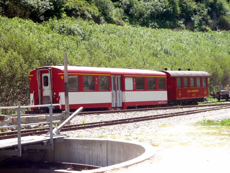 Backup train cars and turntable from the Furka cogwheel steam railway (Dampfbahn Furka-Bergstrecke)
