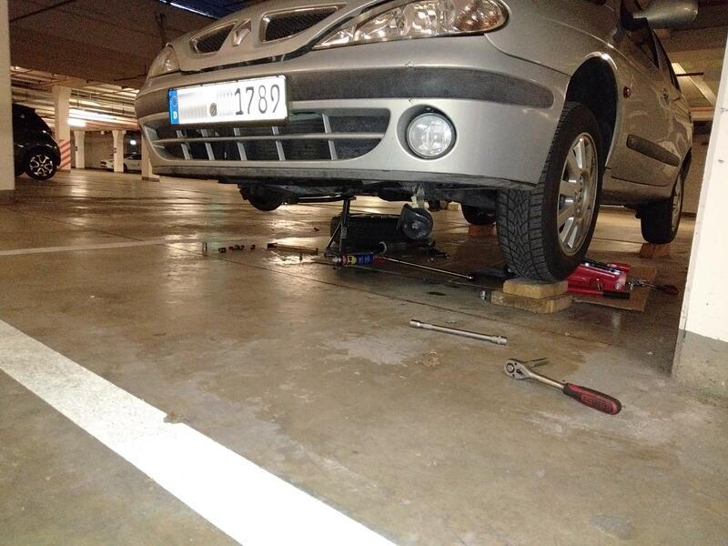 Lifting the car as high as possible with jackstands and wooden blocks Not enough room without lowering the subframe or using a lift